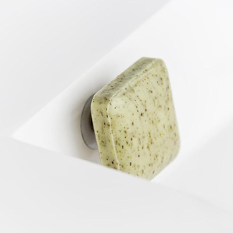 Magnetisk tvålhållare med sugpropp